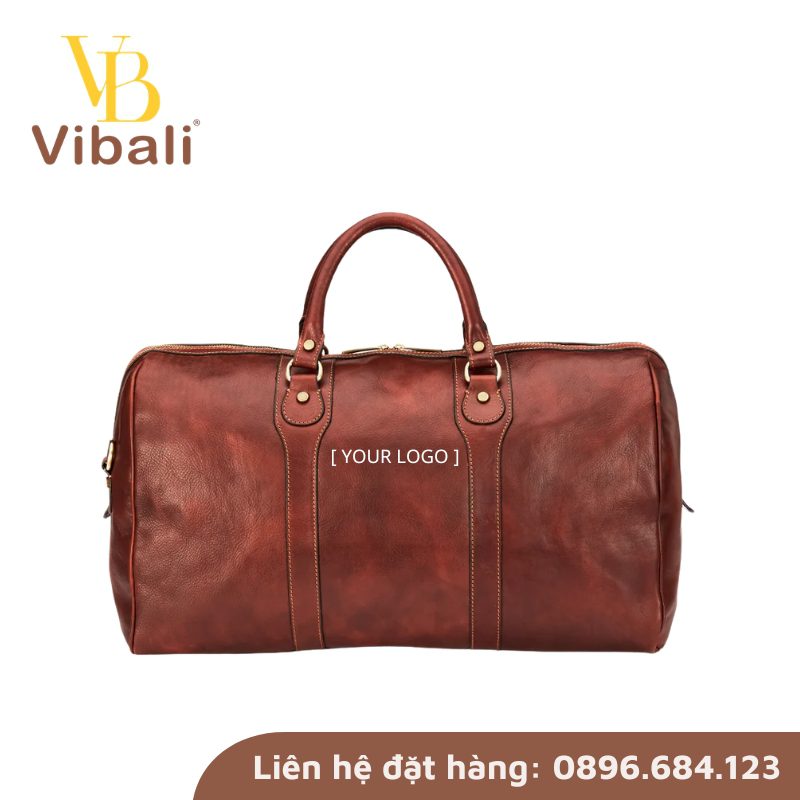 Túi trống du lịch in logo - Quà tặng nhân viên dịp Lễ Lao Động 2026 Túi xách da in logo thương hiệu xu hướng quà tặng 2026